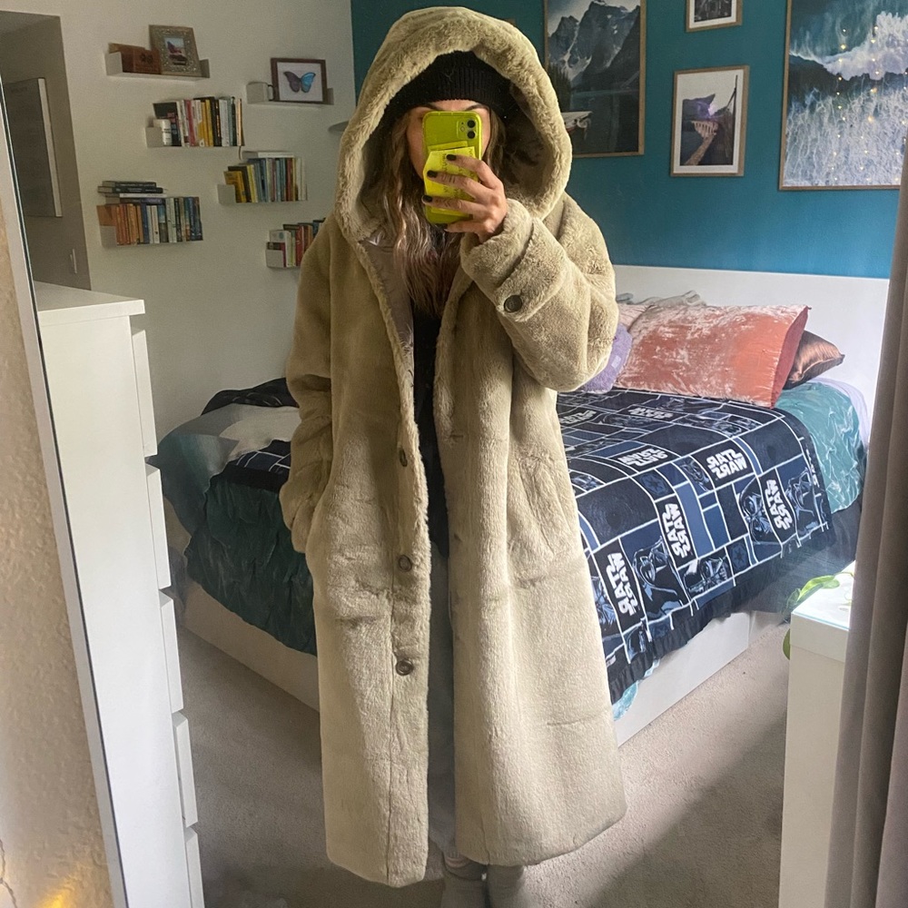 ASOS faux fur jacket. Never been worn. I’m 5’6 and it reaches my lower calf